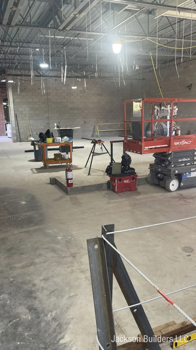Indoor Endless Pool installation in progress with structural steel framing — Jackson Builders project photo 3