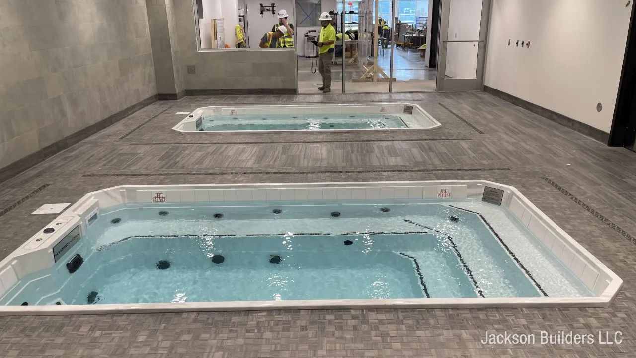 Endless Pool swim spa installed in a commercial fitness room — Jackson Builders project photo 2