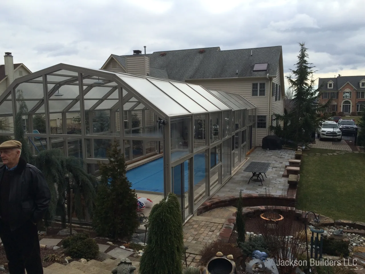 Endless Pool installation with retractable enclosure and custom deck — Jackson Builders project photo 14