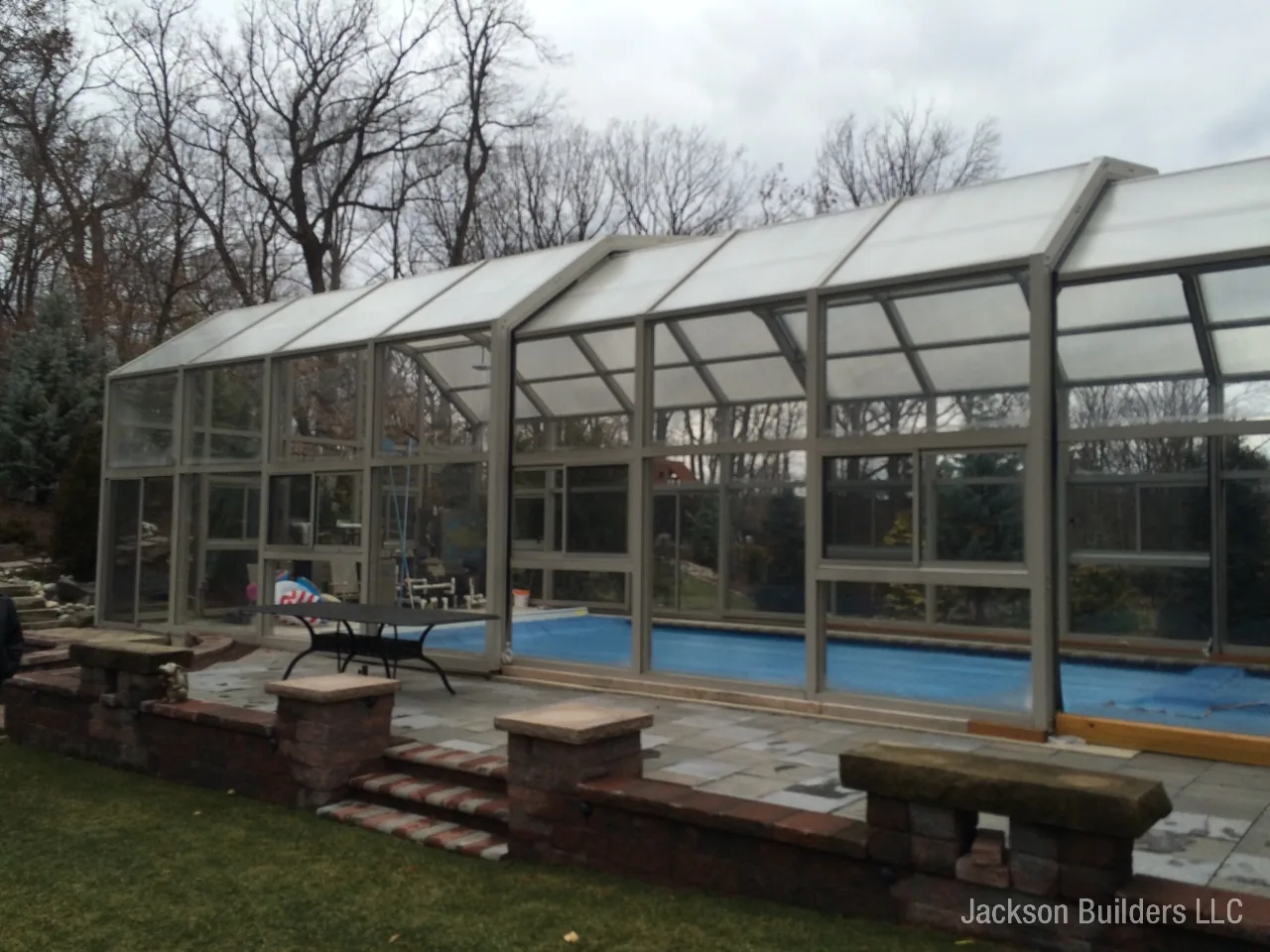 Endless Pool installation with retractable enclosure and custom deck — Jackson Builders project photo 17